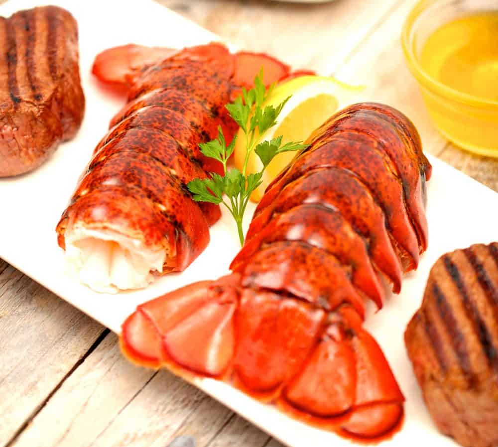 cooked lobster tail with garnish